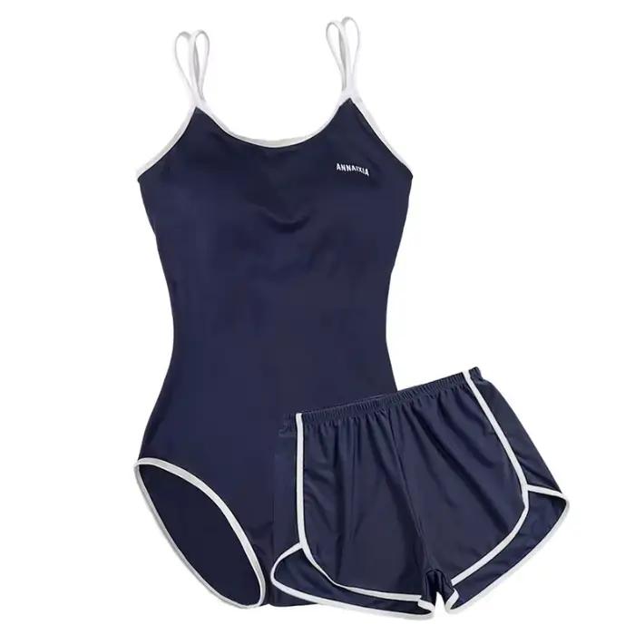 Ensemble de maillot de bain deux pièces bleu marine avec bretelles et short taille haute, adapté pou
