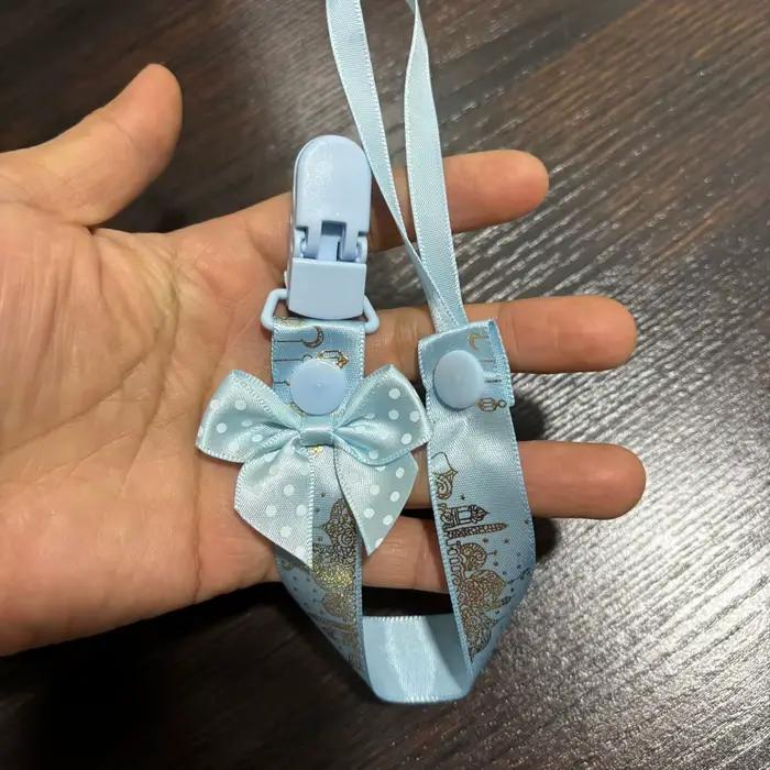 Sucette souple et flexible en forme de téton réel avec capuchon anti-poussière et attache anti-perte