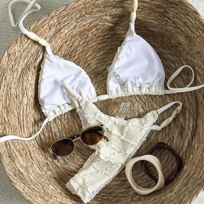Micro bikini string sexy 2026 pour femme, blanc, en dentelle ajourée, avec soutien-gorge push-up, maillot de bain tendance pour l'été et les vacances