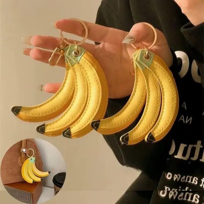 Porte-clés en cuir PU pour femmes, mignon, banane, pêche, breloques, fruits, pendentifs de sac, étanche, accessoires de sac, décor de mode