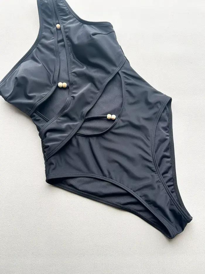 Maillot de bain asymétrique sexy pour femme avec découpes