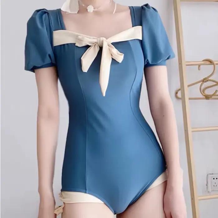 Nouveau Style coréen doux Bikini femmes une pièce mignon coupe ajustée Monokini maillot de bain crème solaire vêtements