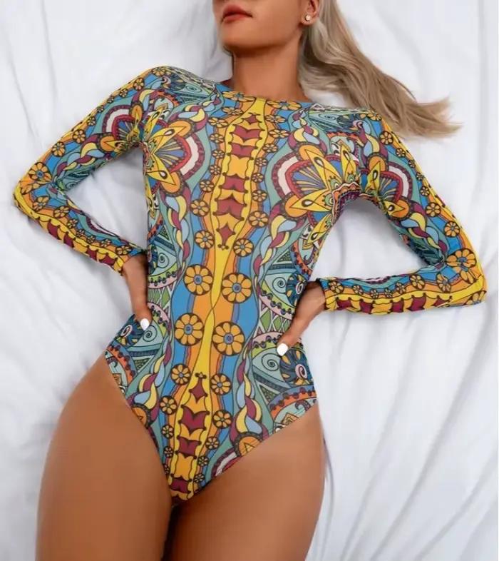 Maillot de bain à manches longues pour femmes avec motif floral, protection UV et solaire, idéal pour la plage, la natation, le surf et les vacances