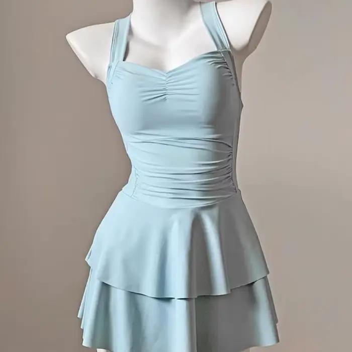 Maillot de bain sexy dos nu pour femme style jupe une piece effet amincissant plage vacances sources chaudes