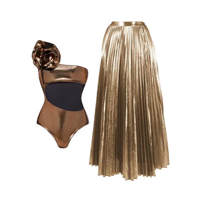 Maillot de bain une pièce brillant doré et jupe pour femmes
