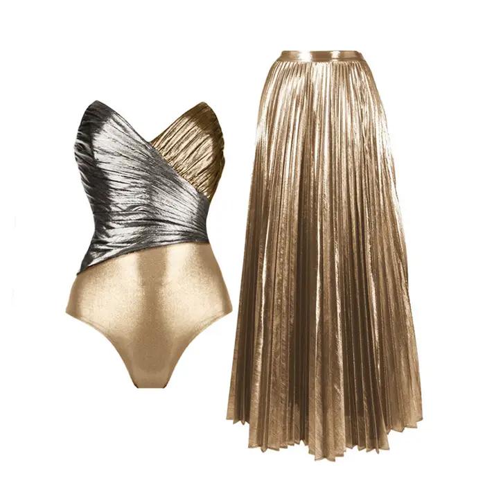 Maillot de bain une pièce brillant doré et jupe pour femmes