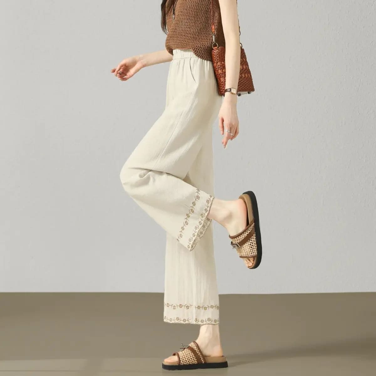 Pantalon large en lin pour femme, taille élastique, broderie florale, poches sur le bas, coupe ample