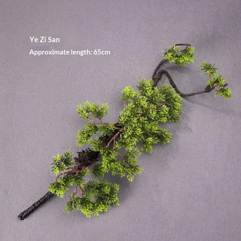 Branches d'arbres artificielles en plastique, feuilles de thuya simulées, création d'un aménagement 