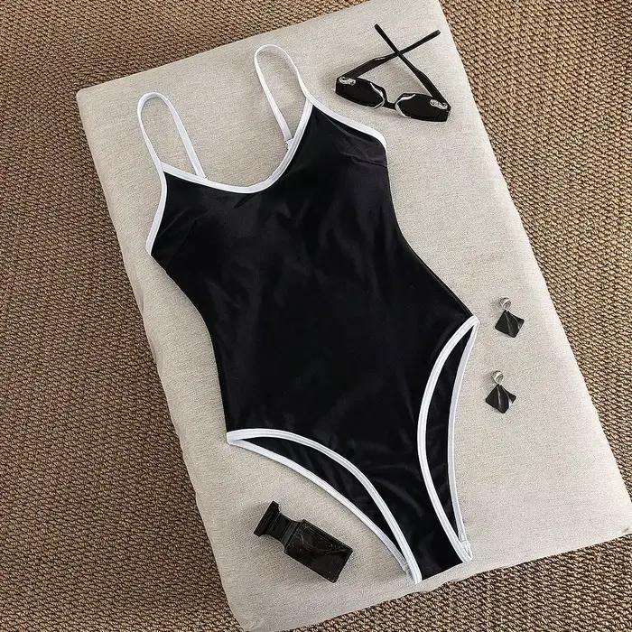 Maillot de bain une pièce noir pour femme avec bordure blanche